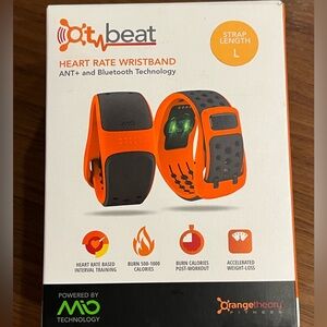 Orangetheory OT heart rate wristband.